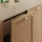 Oak front panels Nizio – open cabinet, kitchen interior view
